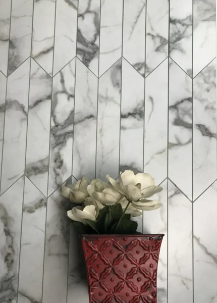 Nature 3.75 in x 11.75 in Glass Chevron Tile in Bianco Carrara